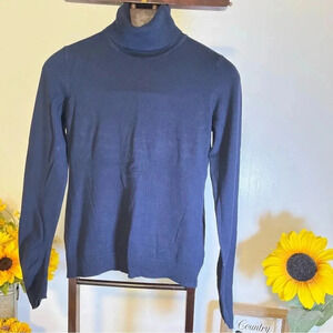 Limited women’s Size M long sleeve turtleneck navy blue weater